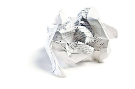 Closeup of a crumpled paper isolated on white backgroundの写真素材