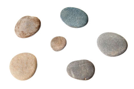 Sea pebbles collection isolated on whiteの写真素材