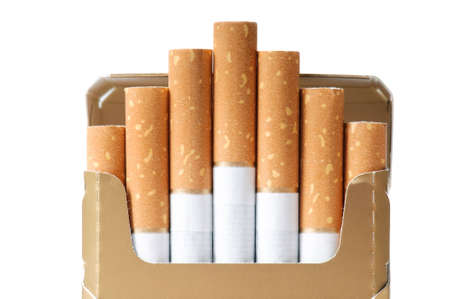 Cigarettes. The open pack of cigarettes with the yellow filterの写真素材