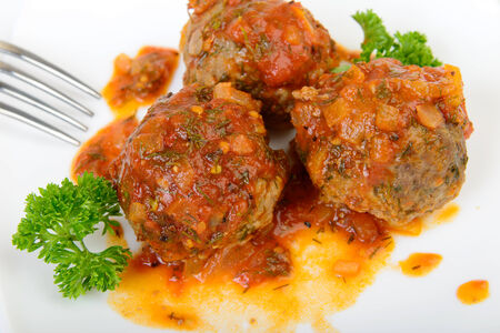 Meatball at plate with forkの写真素材