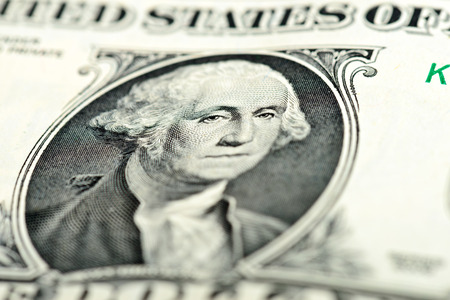 One dollar bill fragment macro Washington eyes