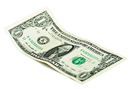 crumpled one dollar on a white background