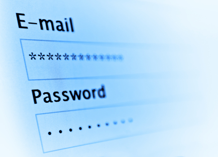 Login and password on monitor screen. Toned on blue
