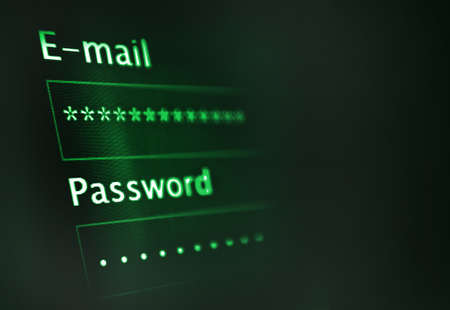 Login and password on dark monitor screenの写真素材