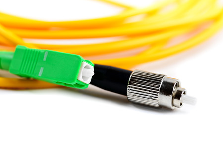 Close up of fibre leads against white backround