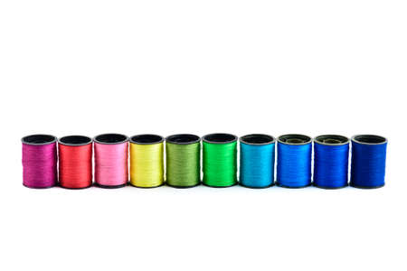 Sewing threads multicolored at white background