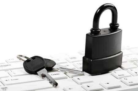 Data security concept with padlock on laptop computer keyboard