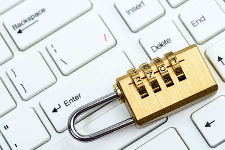 computer and online security with keyboard and padlock