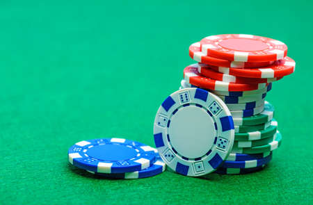 casino chips on green space