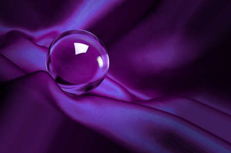 glowing crystal ball shot on purpleの写真素材