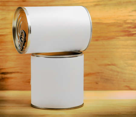 food tin cans on wood background