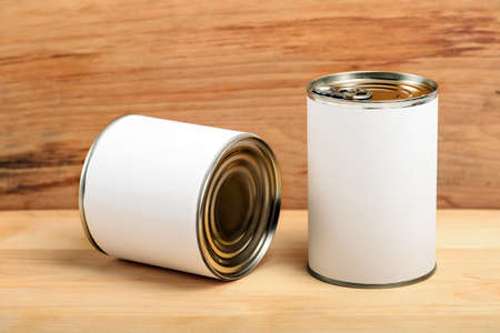food tin cans on wood background
