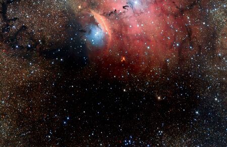 Stars, dust and gas nebula in a far galaxy space background. Stellar nursery. The infinite universeの写真素材