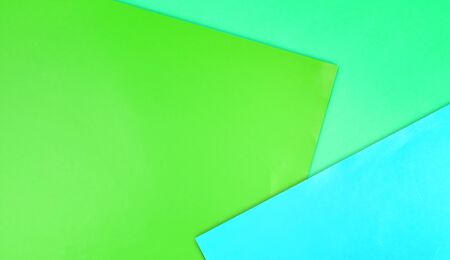 Color paper  background. Three pastel tone - blue, yellow, green divided shadow linesの写真素材