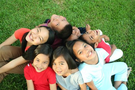 Asian children having fun in the park. の写真素材