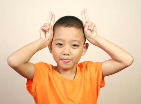 Portrait of young happy boyの写真素材