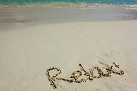 Word Relax on beach - vacation concept backgroundの写真素材