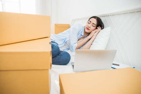 Startup small business entrepreneur SME freelance woman working at home, Young Asian small business owner at home office, online marketing packing delivery, SME e-commerce conceptの写真素材