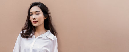 Portrait smile happy beautiful innocence asian woman relax. Asian girl face on white shirt Beauty long hair spa woman treatment perfect clear cosmetology skin. Japanese girl makeup lifestyle lifestyleの写真素材
