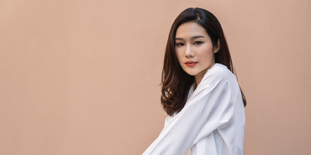 Portrait smile happy beautiful innocence asian woman relax. Asian girl face on white shirt Beauty long hair spa woman treatment perfect clear cosmetology skin. Japanese girl makeup lifestyle lifestyleの写真素材