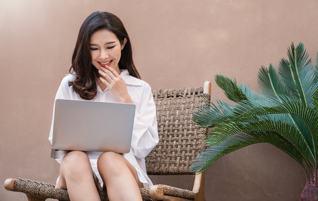 Portrait smile beautiful business asian creative designer woman suit working in office desk virtual computer. Small business owner people employee freelance online sme marketing e-commerce telemarketの写真素材