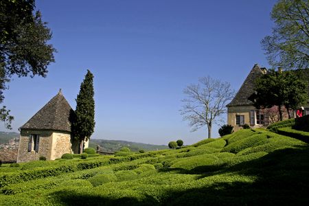 traditional old house in landscaped gardens, marqueyssac, franceの写真素材