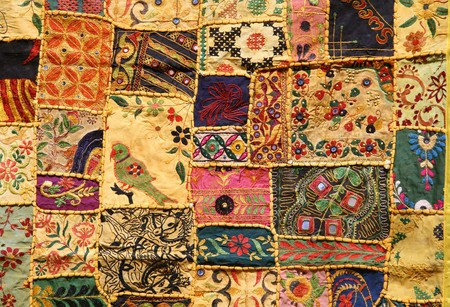 Indian patchwork wall cloth on display in Hampi market, Indiaの写真素材