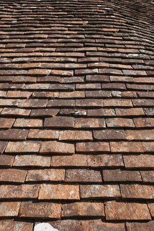 Background of terracotta roof tiles in the village of Rocamadour
