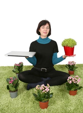 Woman finding a balance in her life between work and natureの写真素材