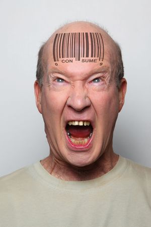 Angry consumer with a bar code on his foreheadの写真素材