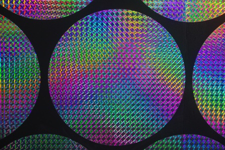 Circular holographic patterns of on backgroundの写真素材