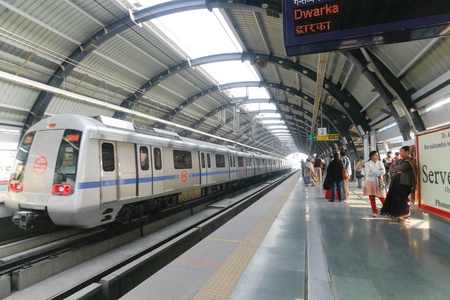 DELHI - SEPTEMBER 18: passengers waiting metro train on September 18, 2007 in Delhi, India. Nearly 1 million passengers use the metro daily. DELHI - SEPTEMBER 18: passengers waiting metro train on September 18, 2007 in Delhi, India. Nearly 1 million passengers use the metro daily.