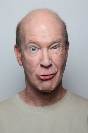 Man making funny faceの写真素材