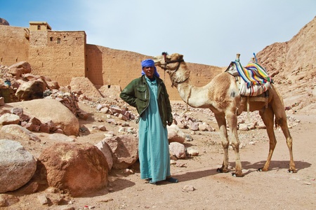 EGYPT - FEBRUARY 5: Camel guide climbing to Mount Sinai on February 5, 2011 in St Catherineのeditorial素材