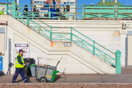 BRIGHTON, UK - FEBRUARY 8, 2011: Street cleaners on seafront on February 8, 2011 in Brighton, UK. Brighton & Hove have over 650 miles of pavement.のeditorial素材