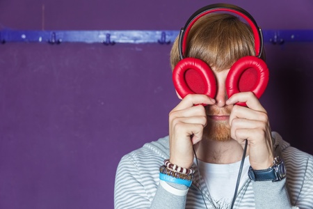 Funny looking man with headphone eyesの写真素材