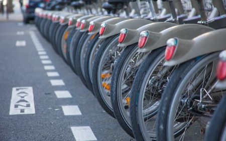 PARIS, FRANCE - JANUARY 6, 2012: Velib bucycles in the row on January 6, 2012 in Paris, France. is a large-scale public bicycle sharing system in Paris, France.のeditorial素材