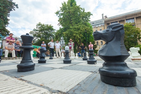 SARAJEVO, BOSNIA - AUGUST 11, 2012  People play outdoor shess game on August 11, 2012 in Sarajevo, Bosnia  Chess is a game that the old inhabitants of Sarajevo boredom in のeditorial素材