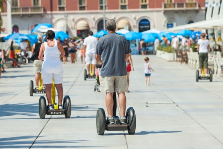 SPLIT, CROATIA - August 26, 2012: People on Segways on the waterfront in Split
 on August 26, 2012 in Split, Croatia. Split is the second largest city in Croatia.のeditorial素材