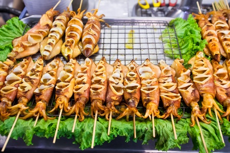 grilled squid on the street in Bangkok