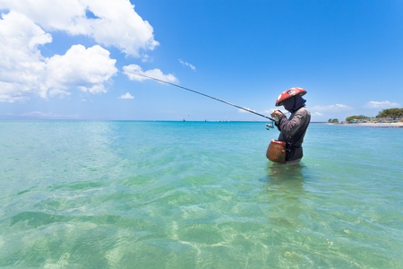 BALI - FEBRUARY 13. Line fishermen on Jimberan beach on February 13, 2012 in Bali, Indonesia. Local fishermen find it harder to make a living due to a lack of fish caused by industrial fishing.のeditorial素材