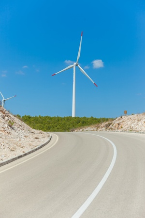 Windmill is a machine that is used to produce electricity.の写真素材