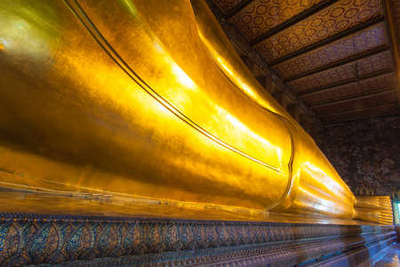 Reclining Buddha in Wat Pho temple in Bangkok, Thailandの写真素材
