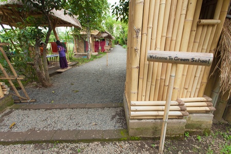 BALI, INDONESIA - FEBRUARY 2012: Entrance to the Green School on February 27, 2012 in Bali, Indonesia. The school is known for promoting eco-friendly concepts to its students.のeditorial素材