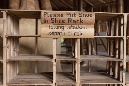 BALI, INDONESIA - FEBRUARY 2012: Shoe rack at the Green School on Februray 27, 2012 in Bali, Indonesia. The school is known for promoting eco-friendly concepts to its students.のeditorial素材