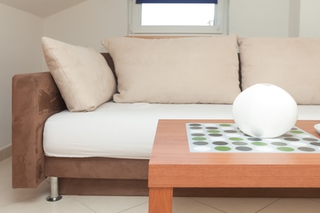 Modern and bright living room interior with sofa in houseの写真素材