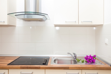 Modern and bright kitchen in house interiorの写真素材