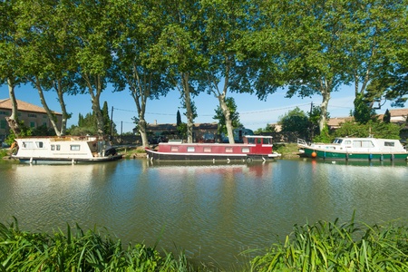 CANAL DU MIDI, FRANCE - JUNE 22: Boats moored in summer on June 22, 2013 on the Canal du Midi, France. The UNESCO listed canal was built in 17th century stretching from Toulouse to Bezier.のeditorial素材