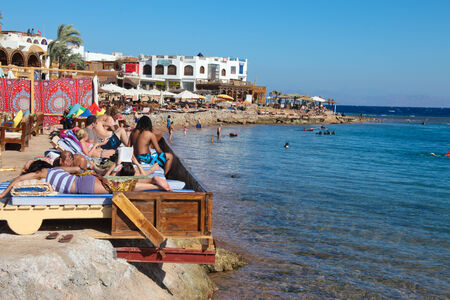 DAHAB - JANUARY 23. Tourists enjoying the Sinai coast in Dahab, Egypt. Dahab is a popular...