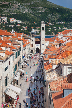 DUBROVNIK, CROATIA - MAY 26, 2014: View on Stradun and the Bell tower from old city walls. Stradun is 300 meters long main pedestrian street in Dubrovnik.のeditorial素材